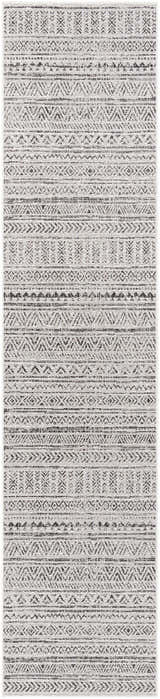 Close-up of the Catrine Indoor & Outdoor Rug. Bohemian style with black, charcoal, and off-white geometric patterns. Design-Runner-2712