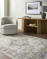 Living room scene with a neutral swivel chair and wood console table on a Cargan Area Rug. Roomscene-Rectangle