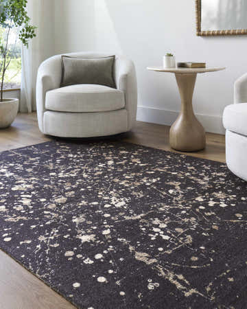 Living room scene with Janek I Modern Abstract Area Rug, beige chairs, and light wood floors. Roomscene-Rectangle