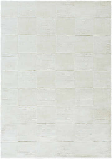 Close-up of the light silver Canice Area Rug, a hand-loomed wool rug with a subtle checkerboard pattern. Design-Rectangle-5377