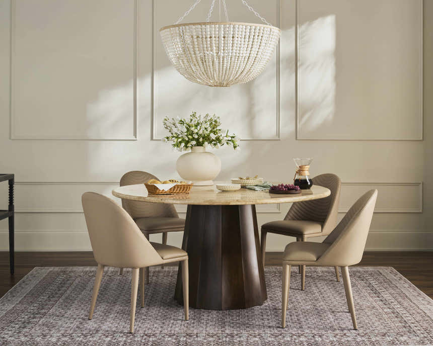 Dining room with Rainier Light Brown Washable Rug, round table, beige chairs, and beaded chandelier. Farmhouse style. Roomscene-Rectangle