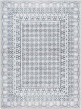 Close-up of the Rainier Gray Washable Rug. Farmhouse style rug features a traditional geometric pattern in off white, pale blue, and sage. Design-Rectangle-5373