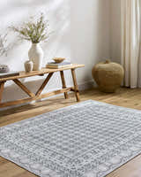 Entryway with Rainier Gray Washable Rug. Farmhouse style with wood bench, vases, and woven basket. Neutral tones. Roomscene-Rectangle