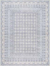 Close-up of Rainier Blue Washable Rug. Farmhouse style rug with pale blue, white, and gray traditional pattern. Design-Rectangle-5373