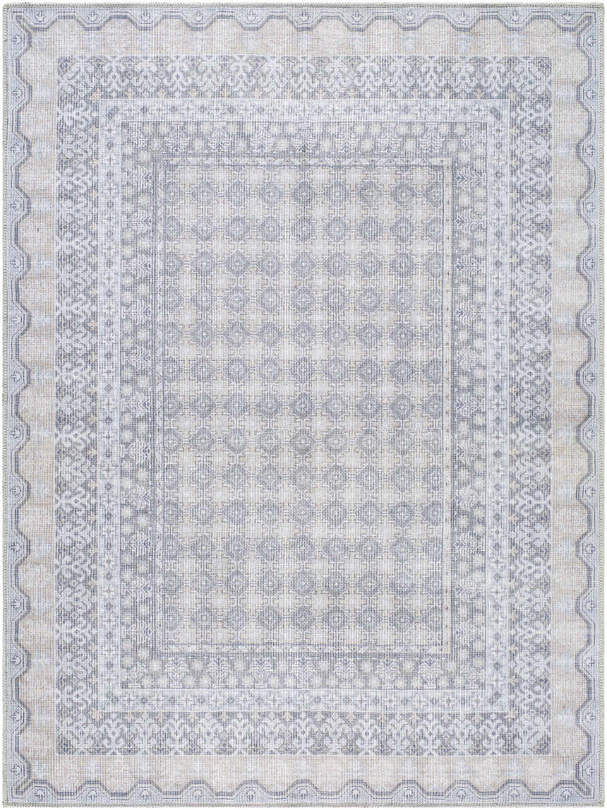Close-up of Rainier Blue Washable Rug. Farmhouse style rug with pale blue, white, and gray traditional pattern. Design-Rectangle-5373