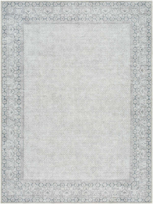 Close-up of Rainier Cottage Border Gray Washable Rug. Farmhouse style with blue and gray border, geometric pattern. Design-Rectangle-5373