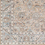 Close-up of the Civankan Area Rug. Machine-woven polyester rug in brick red, denim, and light gray with a traditional oriental pattern. Swatch