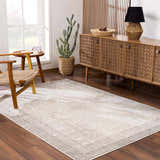 Living room scene with Colson Sage Area Rug, wood furniture, and neutral tones. Roomscene-Rectangle