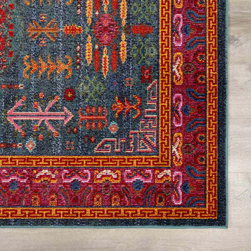 Close-up of the Cleveland Colorful Traditional Area Rug with teal, red, yellow, and aqua hues. Features a vintage-inspired pattern. Swatch