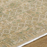 Close-up of the hand-crafted Becki Owens x Livabliss Renaissance BORI-2304 area rug. Beige, olive, and tan traditional pattern. Texture