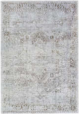 Close-up of the Clodia Area Rug. Hand-tufted polyester rug in charcoal, ivory, silver gray, and taupe with a traditional pattern. Design-Rectangle-576