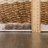 Close up of the Canika Brown Washable Checkered Area Rug showing pile height with a ruler and basket. Pile