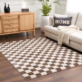 Living room scene with a Canika Brown Washable Checkered Area Rug, sofa, wood cabinet, and potted plant. Roomscene-Rectangle