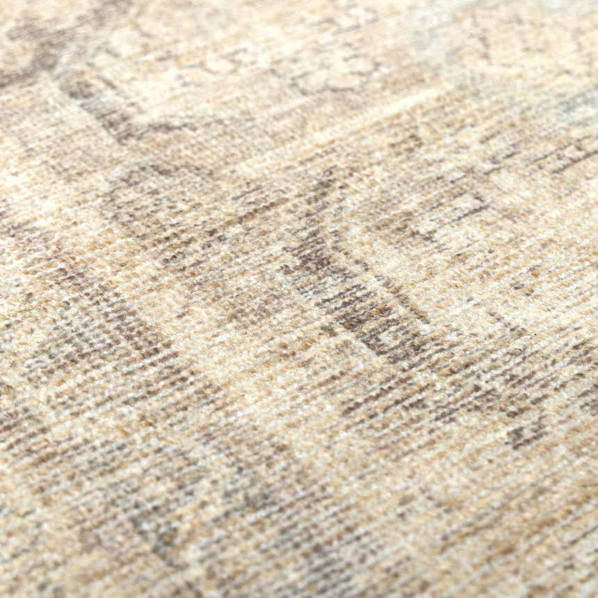 Close-up of the Fetscher V Vintage Damask Area Rug, showing its tan, ivory, and gray textured weave and subtle damask pattern. Texture