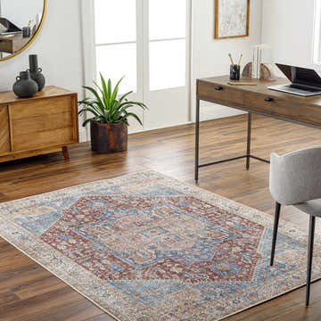 Home office with a Como Washable Runner Rug in blue, brick red, and beige, styled under a desk and chair on a wood floor. Roomscene-Rectangle