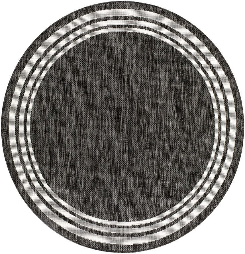 Close-up of an oval Coonamble Bordered Antrasit Rug. Charcoal rug with a cream striped border. Machine woven texture. Design-Round-53