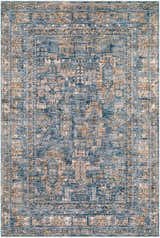 Close-up of the Mirabel Denim Blue Traditional Rug. Features cream, blue, brown, and gray tones in a bohemian pattern. Design-Rectangle-537
