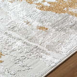 Close up of the Chroma Area Rug showing ivory, light gray, and mustard colors with a contemporary design. Texture