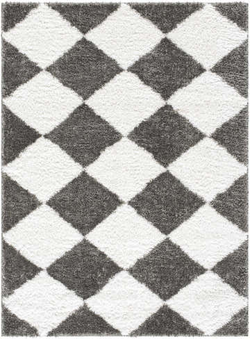 Close-up of the Celine Area Rug, a shag rug with a charcoal and cream diamond pattern. Design-Rectangle-537