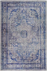 Close-up of the hand-tufted Csilla Area Rug. Traditional design in arctic sky, blue, ivory, and slate blue. Design-Rectangle-576