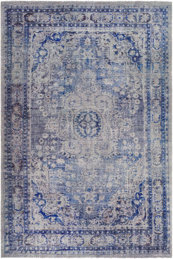 Close-up of the hand-tufted Csilla Area Rug. Traditional design in arctic sky, blue, ivory, and slate blue. Design-Rectangle-576