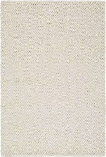 Close-up of the hand woven texture of the Cqasce Navy Solid Wool Area Rug. Neutral color and chunky weave. Design-Rectangle-576