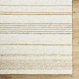 Close-up of the hand woven Ciaran Area Rug. Ivory rug with sandstone and taupe stripes, farmhouse style. Swatch