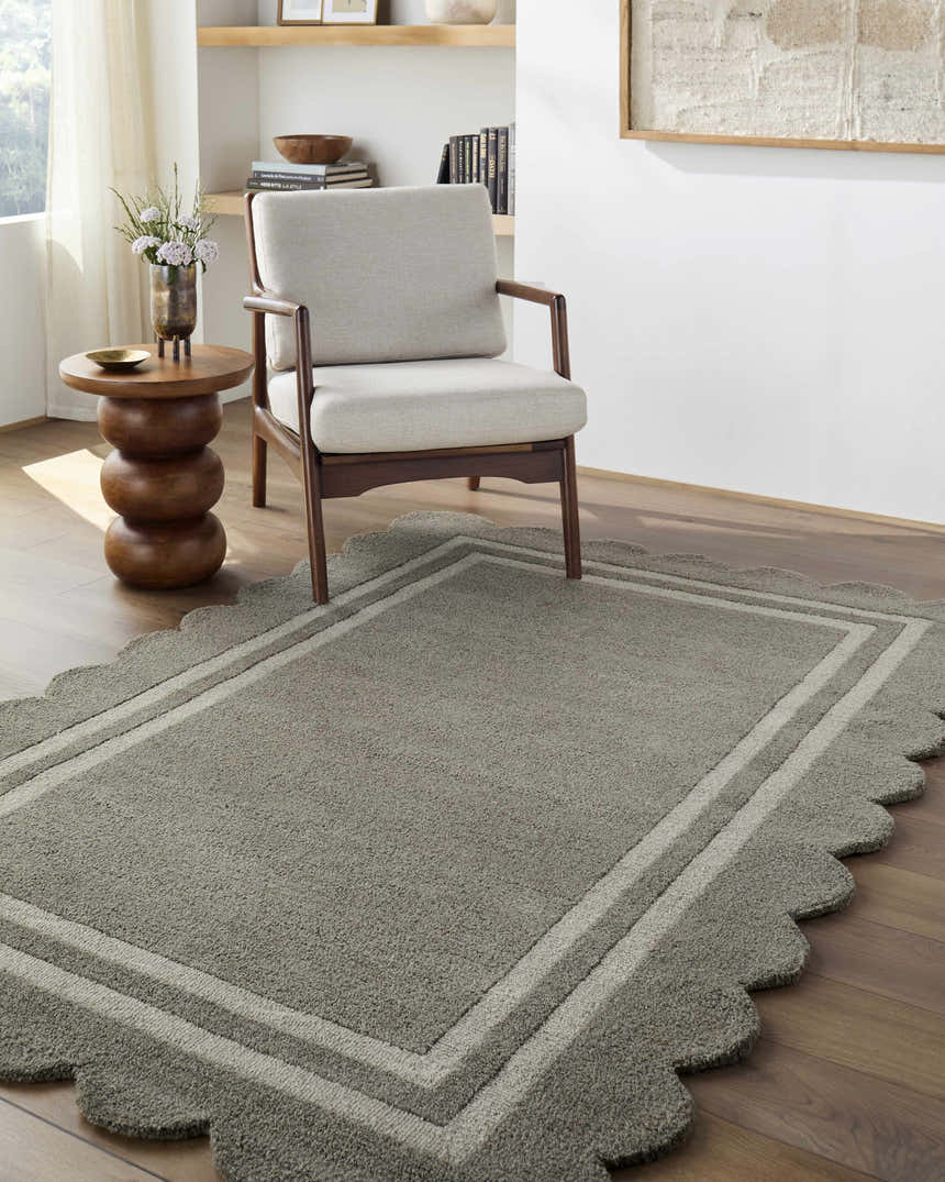 Entryway scene with a gray Chogan Stone Area Rug, neutral chair, and wood accents. Contemporary style. Roomscene-Rectangle