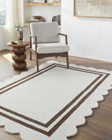 Entryway with a Chogan Ivory Area Rug, wood floors, chair, and side table. Contemporary style. Roomscene-Rectangle