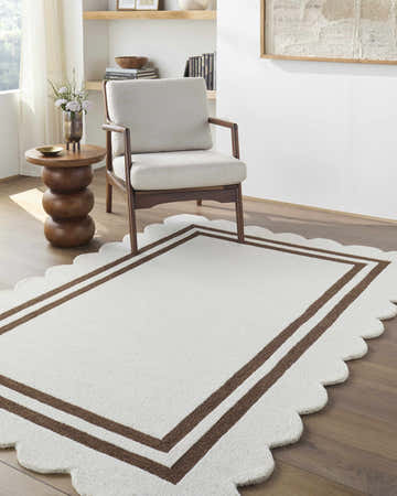 Entryway with a Chogan Ivory Area Rug, wood floors, chair, and side table. Contemporary style. Roomscene-Rectangle