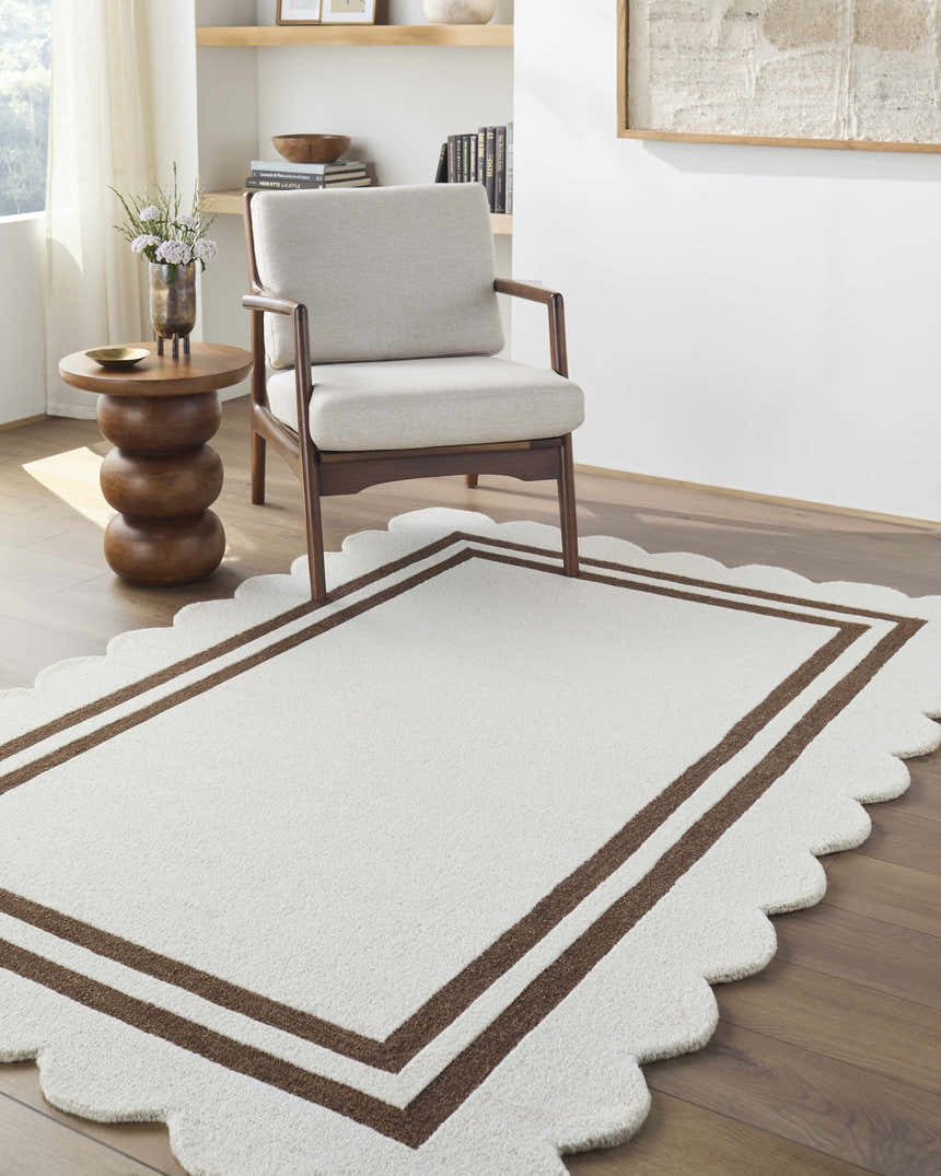 Entryway with a Chogan Ivory Area Rug, wood floors, chair, and side table. Contemporary style. Roomscene-Rectangle