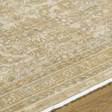Close up of the Becki Taupe Owens x Livabliss Renaissance Area Rug. Beige, tan, and taupe traditional wool rug. Texture