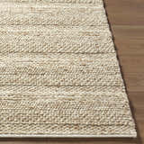 Close-up of the Ctadqe Beige Stripe Hand Woven Wool Area Rug showing texture and medium brown stripes on wood floor. Front