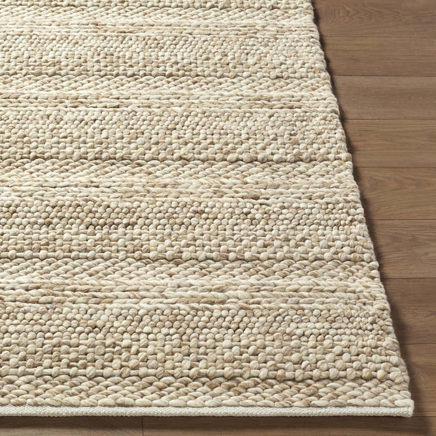 Close-up of the Ctadqe Beige Stripe Hand Woven Wool Area Rug showing texture and medium brown stripes on wood floor. Front