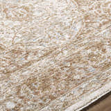 Close-up of the Charae Ivory Area Rug, showing beige, ivory, and sandstone tones in a traditional, machine-woven pattern. Texture
