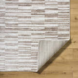 Close-up of Cemach Light Brown Area Rug showing contemporary stripe pattern and polypropylene texture. Fold