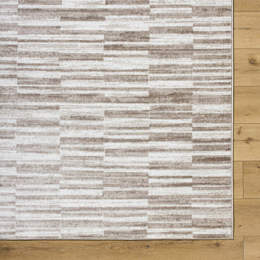 Close-up of Cemach Light Brown Area Rug with a contemporary geometric pattern in light brown and white. Swatch