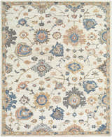 Close-up of the Candid Oushak Area Rug, a cream wool rug with light brown, steel blue, and gray floral and vine pattern. Design-Rectangle-810