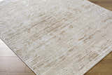 Close up of the contemporary Candie Beige Area Rug showing its cream, tan, and beige pattern and texture. Corner