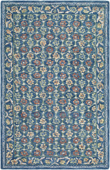 Close-up of the Ardith Area Rug. Hand-tufted wool rug with a blue floral pattern and a decorative border. Design-Rectangle-576