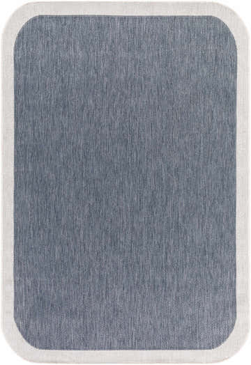 Close-up of the Chetan Blue Outdoor Rug. Features a textured blue weave and a cream border. Design-Rectangle-537