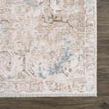 Close-up of the Beige Holi-4600 Washable Area Rug. Features a traditional vintage pattern with cream, brown, and blue tones. Swatch