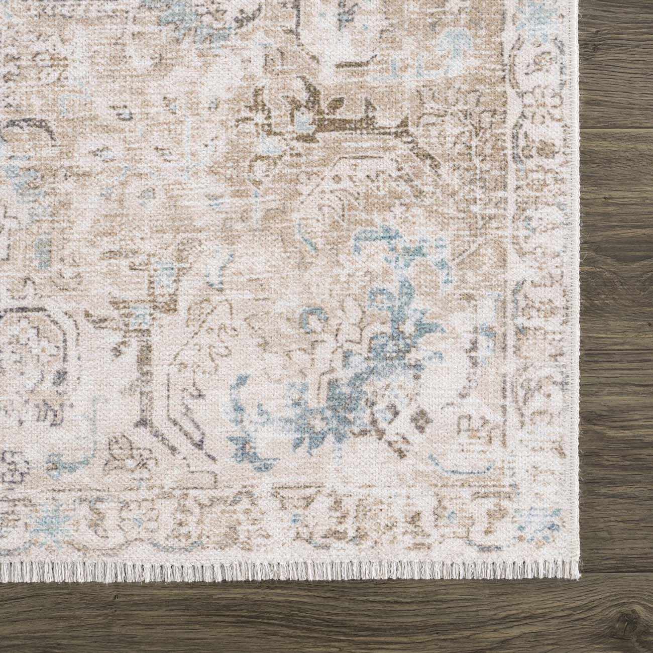 Close-up of the Beige Holi-4600 Washable Area Rug. Features a traditional vintage pattern with cream, brown, and blue tones. Swatch