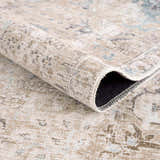 Close-up of the Beige Holi-4600 Washable Area Rug, showing its traditional vintage pattern and soft, neutral cream and brown colors. Fold