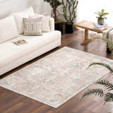 Living room scene with a Beige Holi-4600 Washable Area Rug, cream sofa, wood floor, and plants. Farmhouse style. Roomscene-Rectangle