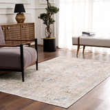 Living room scene with Beige Holi-4600 Washable Area Rug, brown wood floors, console table, and armchair. Roomscene-Rectangle