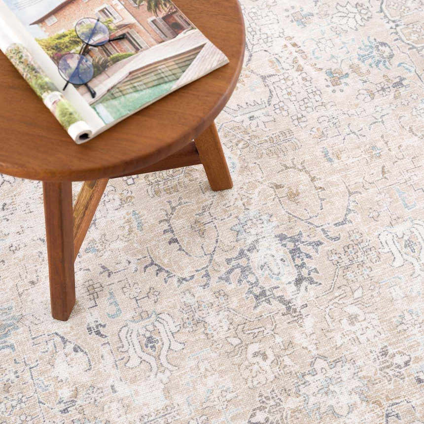 Close-up of the Beige Holi-4600 Washable Area Rug with traditional vintage design in cream, brown, and peach colors. Styleshot