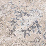 Close-up of the Beige Holi-4600 Washable Area Rug, featuring a traditional vintage pattern in cream, brown, and peach tones. Texture