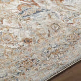 Close-up of the Chikao Cream Area Rug. Beige, cream, mustard, and slate blue farmhouse traditional design. Texture