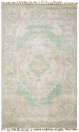 Close-up of the hand-knotted Danao Premium Rug. Cream wool rug with light sage, ice blue, and dusty pink accents. Design-Rectangle-23